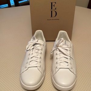 Beautiful Ellen Degeneres White Leather Sneakers with Gray Suede on the back.